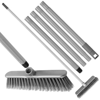 A grey broom dismantled into 5 pieces, 4 handle sections and the head. The head and one piece are threaded for screwing together. White background.
