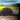 Worm cast product with text about its benefits on a blurred natural background