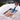Person using a snow shovel with salt to clear snow, with text about fast acting snow melting.