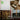Collage of various wooden elements including a door, chair, pallets, and window with text 'Break it Up'.