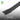 Metal crowbar with bevelled edges on a grey background