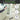 Long handle indoor broom with text highlighting benefits on a blurred background