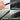Collage of a product being used on a car window with text highlighting features like indoor & outdoor suitability, strong bond, long-lasting adhesion, and weather resistance.