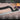Measuring and levelling tool with ruler on a blurred construction site background