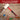 Red mallet with black handle on a wooden surface with tools, text about suitability contractors and DIY enthusiasts.