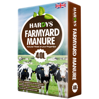 Bag of Hardys Farmyard Manure with cows on a grassy field