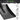 Close in shot of the metal head of a coal shovel with features listed on a white background