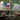 Collage of outdoor elements including a children's play park, pathway, outdoor bbq, and patio furniture with text on natural decoration.