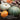 Assorted pumpkins and vegetables with text about soil supercharging.