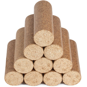 Stack of compressed wooden logs in a pyramid stack on a white background